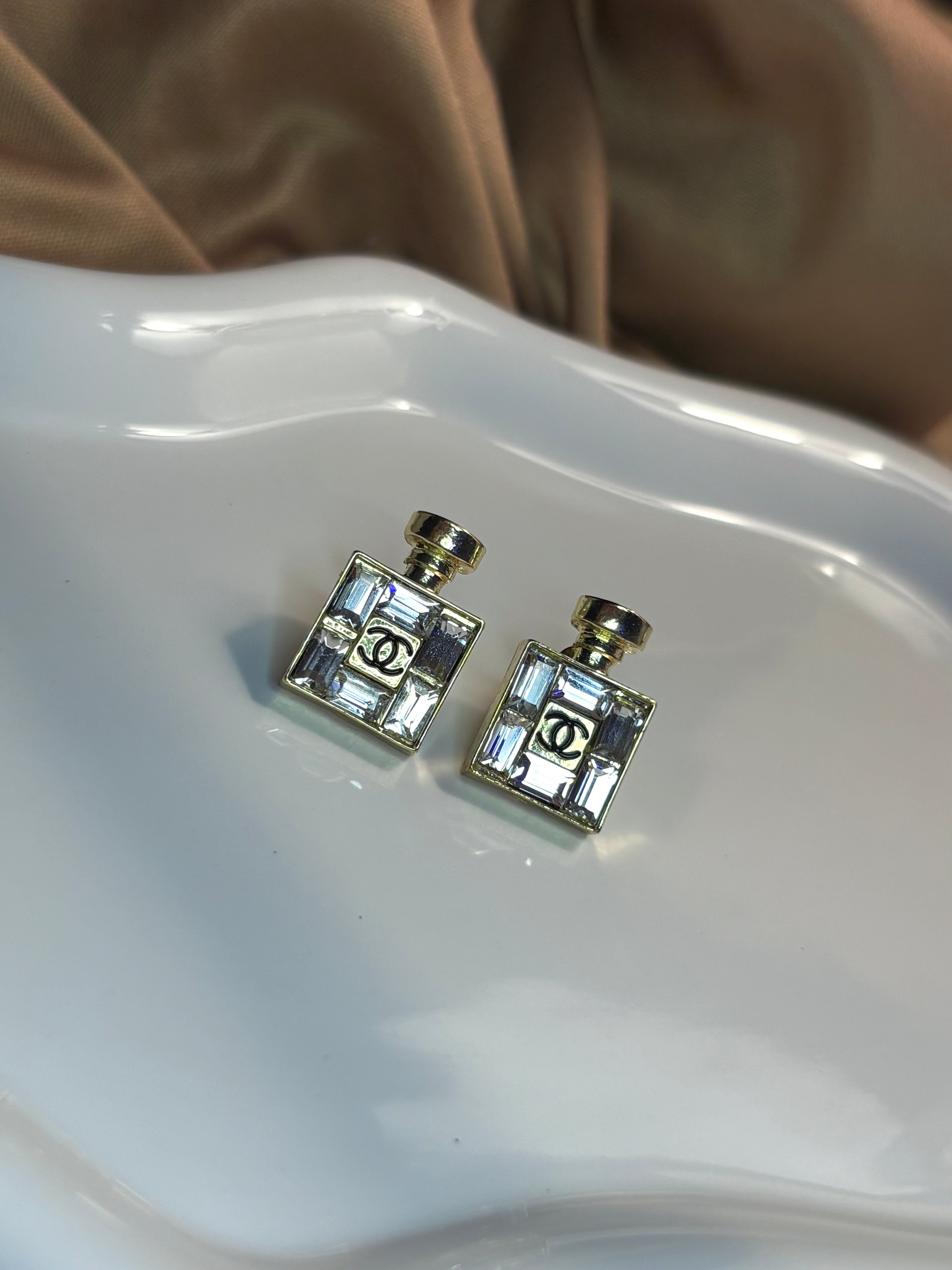 Crystal Perfume stud earrings.