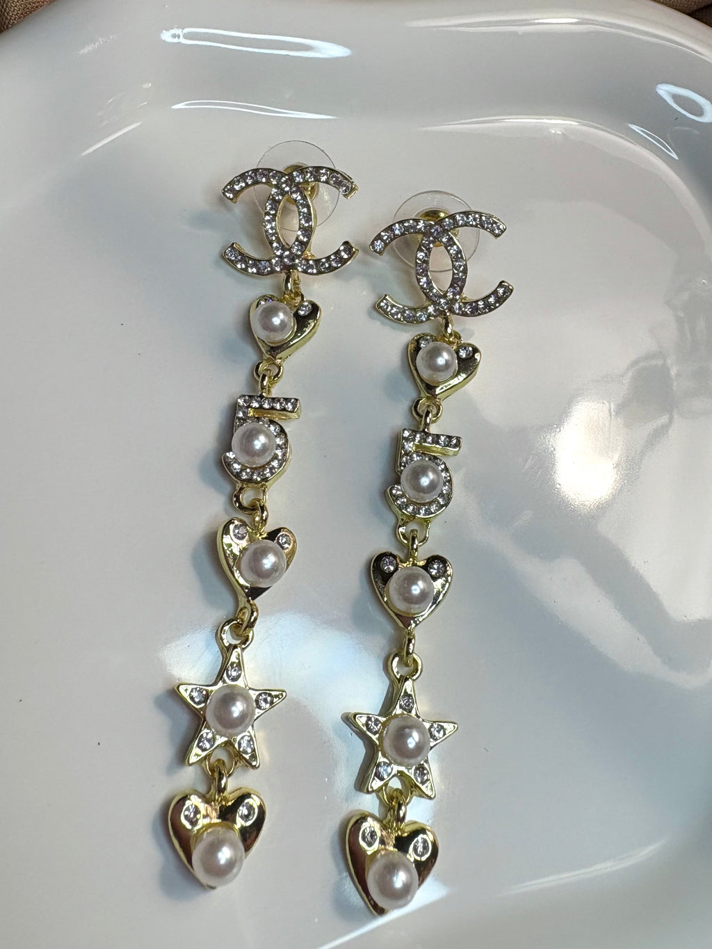 Celeste Pearl drop earrings.