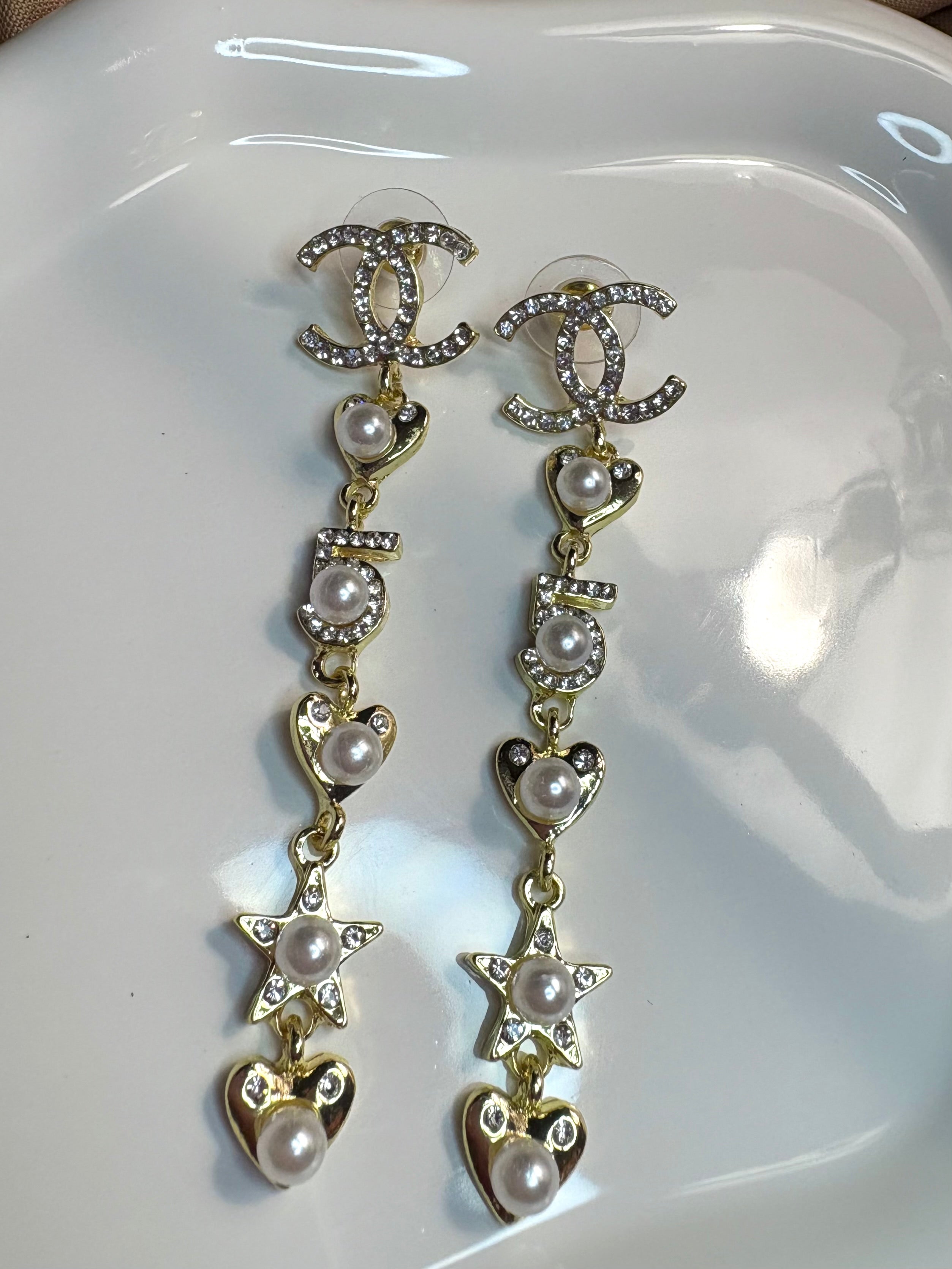 Celeste Pearl drop earrings.