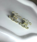 Crystal Fleur stud earrings.