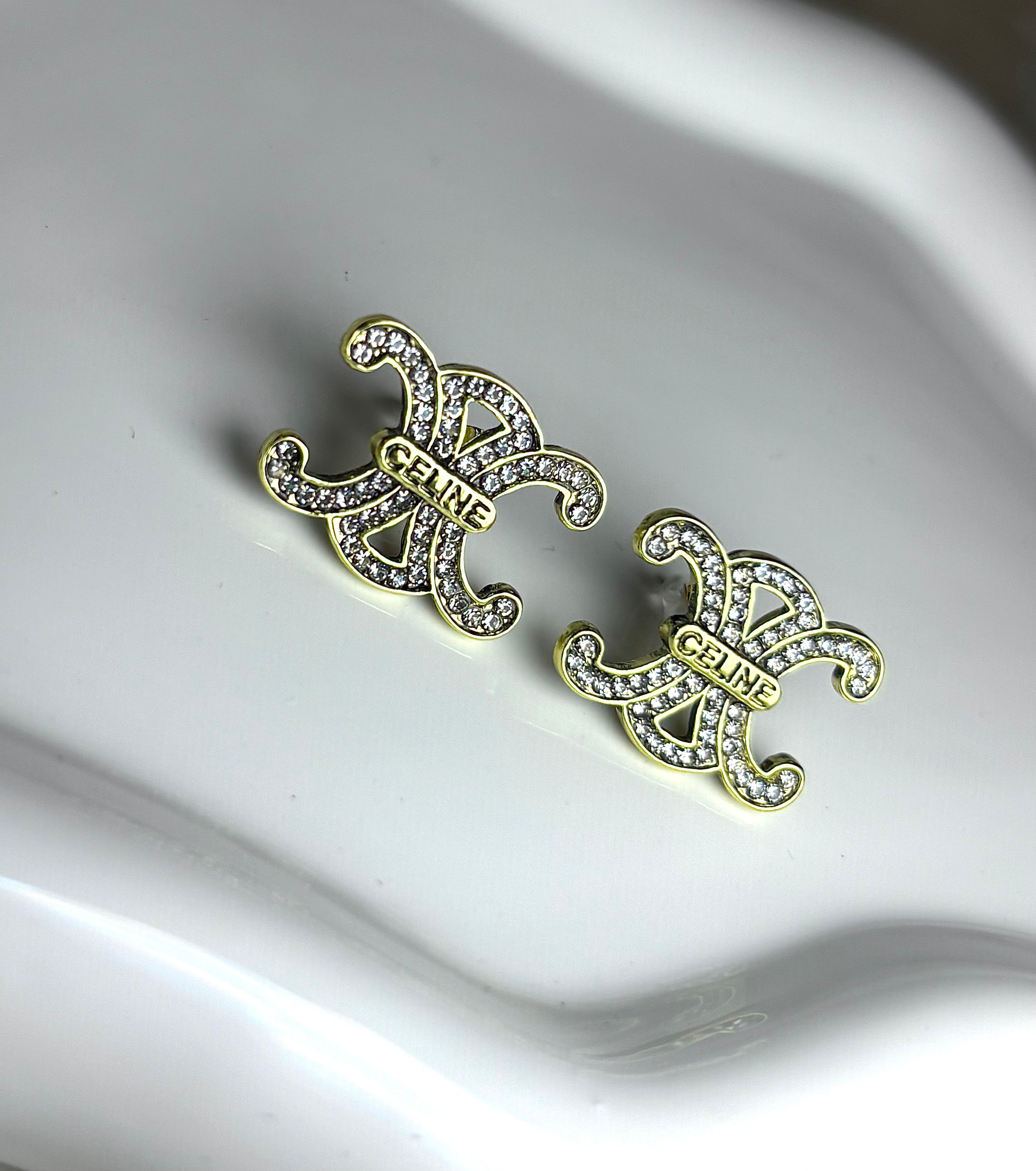 Crystal Fleur stud earrings.